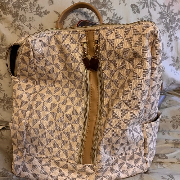Handbags - NWOT Geometric Patterned Tan Backpack